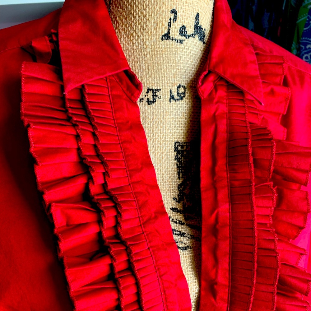 Red button down top with ruffle detail